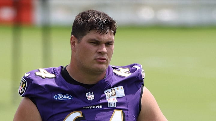 Jun 10, 2025; Baltimore, MD, USA; Baltimore Ravens center Tyler Linderbaum (64) looks on during an NFL OTA at Under Armour Performance Center. Mandatory Credit: Daniel Kucin Jr.-Imagn Images