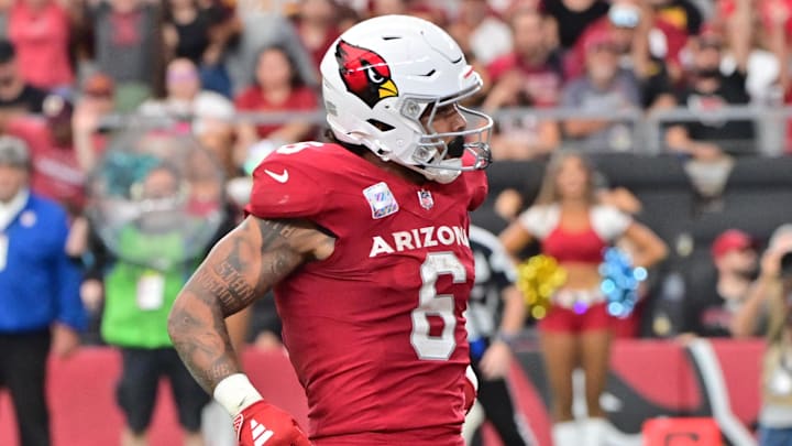 Sep 29, 2024; Glendale, Arizona, USA;  Arizona Cardinals running back James Conner (6) celebrates after scoring a touchdown in the second half against the Washington Commanders at State Farm Stadium. Mandatory Credit: Matt Kartozian-Imagn Images