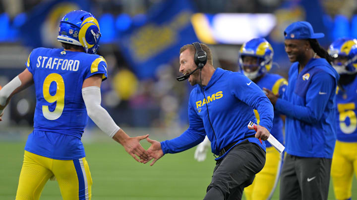 Jan 4, 2026; Inglewood, California, USA;  Los Angeles Rams head coach Sean McVay reacts with quarterback Matthew Stafford (9) after a touchdown against the Arizona Cardinals during the second half at SoFi Stadium. Mandatory Credit: Jayne Kamin-Oncea-Imagn Images