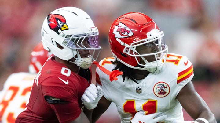 Aug 9, 2025; Glendale, Arizona, USA; Arizona Cardinals cornerback Will Johnson (0) against Kansas City Chiefs wide receiver Jalen Royals (11) during a preseason NFL game at State Farm Stadium. Mandatory Credit: Mark J. Rebilas-Imagn Images