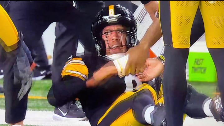 Aaron Rodgers was tackled by his teammate Broderick Jones after scoring a touchdown last week.