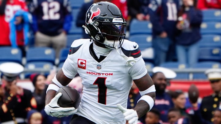 Oct 13, 2024; Foxborough, Massachusetts, USA; Houston Texans wide receiver Stefon Diggs (1) warms up prior to the game against the New England Patriots at Gillette Stadium. Mandatory Credit: Gregory Fisher-Imagn Images