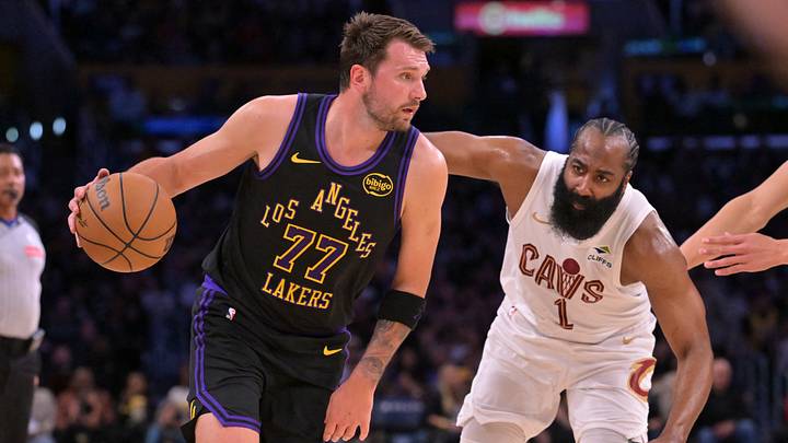 Mar 31, 2026; Los Angeles, California, USA; Los Angeles Lakers guard Luka Doncic (77) is defended by Cleveland Cavaliers guard James Harden (1) as he drives to the basket in the first half at Crypto.com Arena. Mandatory Credit: Jayne Kamin-Oncea-Imagn Images Mar 31, 2026; Los Angeles, California, USA; Los Angeles Lakers guard Luka Doncic (77) is defended by Cleveland Cavaliers guard James Harden (1) as he drives to the basket in the first half at Crypto.com Arena. Mandatory Credit: Jayne Kamin-Oncea-Imagn Images