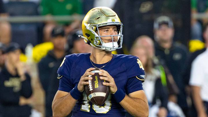 Sep 20, 2025; South Bend, Indiana, USA; A Notre Dame Fighting Irish quarterback CJ Carr (13) looks to pass against the Purdue Boilermakers during the second half at Notre Dame Stadium. 