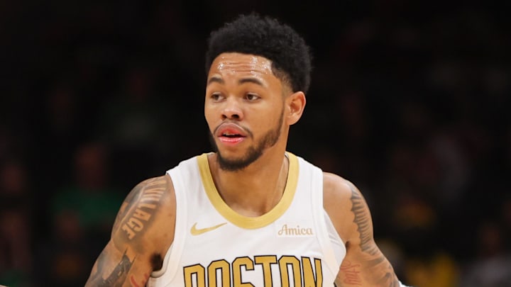 Jan 17, 2026; Atlanta, Georgia, USA; Boston Celtics guard Anfernee Simons (4) dribbles against the Atlanta Hawks in the fourth quarter at State Farm Arena. Mandatory Credit: Brett Davis-Imagn Images