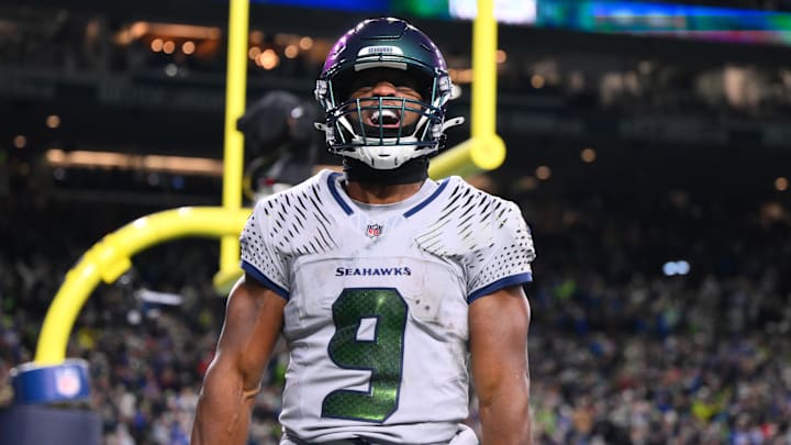 Dec 18, 2025; Seattle, Washington, USA; Seattle Seahawks running back Kenneth Walker III (9) celebrates after scoring a touchdown against the Los Angeles Rams in the second half at Lumen Field. Mandatory Credit: Steven Bisig-Imagn Images
