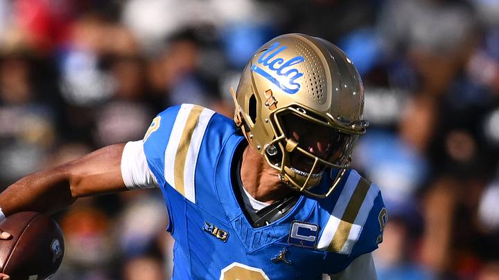 Sep 12, 2026; Pasadena, California, USA; UCLA quarterback Nico Iamaleava (9) runs with the ball while under pressure from San Diego State linebacker Tano Letuli (21) during the first half at the Rose Bowl. Mandatory Credit: William Liang-Imagn Images Sep 12, 2026; Pasadena, California, USA; UCLA quarterback Nico Iamaleava (9) runs with the ball while under pressure from San Diego State linebacker Tano Letuli (21) during the first half at the Rose Bowl. Mandatory Credit: William Liang-Imagn Images