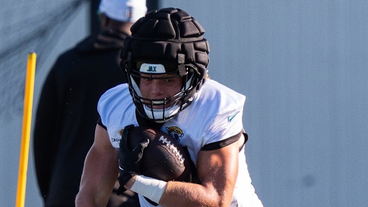Jacksonville Jaguars tight end Hunter Long (84) weaves through the poles and knocks down a dummy during the Jacksonville Jaguars’ 18th and final training camp practice at Miller Electric Center in Jacksonville, Fla. Wednesday August 20, 2025. [Doug Engle/Florida Times-Union]