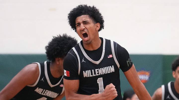 Millennium Tigers guard Adan Diggs (1) celebrates his dunk against the Sunnyslope Vikings during their game at Sunnyslope High School on Jan. 21, 2026.