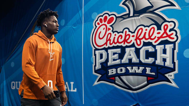 Texas Longhorns linebacker Anthony Hill Jr. (0) walks onto the field as the Texas Longhorns prepare to play the Arizona State Sun Devils in the Peach Bowl College Football Playoff quarterfinal at Mercedes-Benz Stadium in Atlanta, Georgia, Jan. 1, 2025.