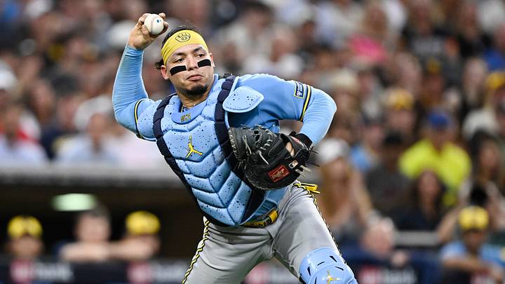Aug 10, 2026; San Diego, California, USA; Milwaukee Brewers catcher William Contreras (24) throws out San Diego Padres shortstop Sung-Mun Song (24) during the third inning at Petco Park. Mandatory Credit: Denis Poroy-Imagn Images