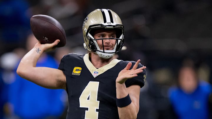 Dec 1, 2024; New Orleans, Louisiana, USA; New Orleans Saints quarterback Derek Carr (4) throws before a game against the Los Angeles Rams at Caesars Superdome. Mandatory Credit: Matthew Hinton-Imagn Images