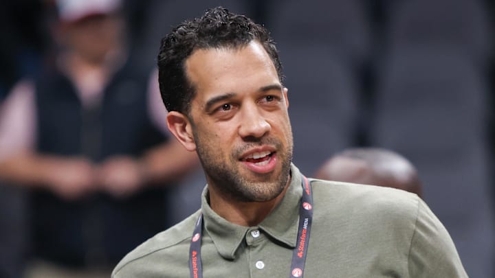 Atlanta Hawks general manager Landry Fields on the floor against the Charlotte Hornets.