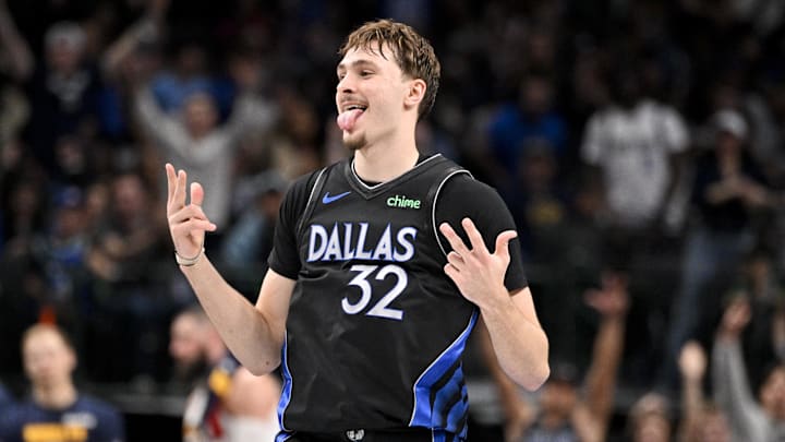 Dec 23, 2025; Dallas, Texas, USA; Dallas Mavericks forward Cooper Flagg (32) celebrates a three point basket during the second half against the Denver Nuggets at the American Airlines Center. Mandatory Credit: Jerome Miron-Imagn Images