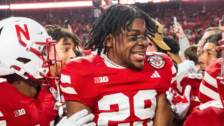Nebraska Cornhuskers defensive back Braylen Prude celebrates with teammates after the Huskers' 2024 win over Wisconsin.