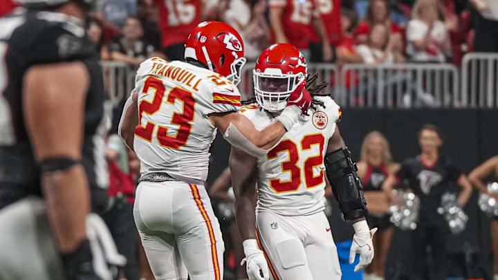 Sep 22, 2024; Atlanta, Georgia, USA; Kansas City Chiefs linebacker Drue Tranquill (23) and linebacker Nick Bolton (32) react after the Chiefs stopped the Atlanta Falcons on fourth down during the second half at Mercedes-Benz Stadium. Mandatory Credit: Dale Zanine-Imagn Images Sep 22, 2024; Atlanta, Georgia, USA; Kansas City Chiefs linebacker Drue Tranquill (23) and linebacker Nick Bolton (32) react after the Chiefs stopped the Atlanta Falcons on fourth down during the second half at Mercedes-Benz Stadium. Mandatory Credit: Dale Zanine-Imagn Images