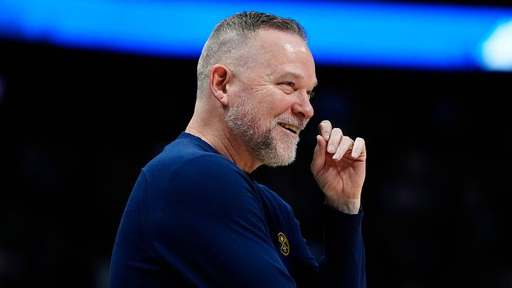 Mar 28, 2025; Denver, Colorado, USA; Denver Nuggets head coach Michael Malone  reacts in the second half against the Utah Jazz at Ball Arena. Mandatory Credit: Ron Chenoy-Imagn Images