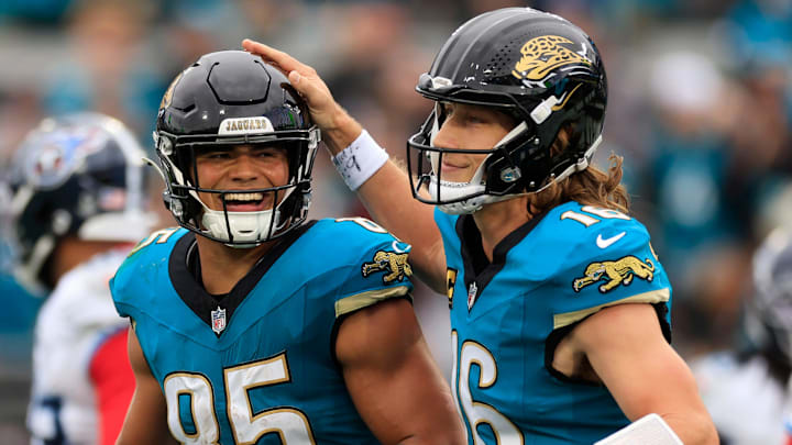 Jacksonville Jaguars tight end Brenton Strange (85) is congratulated by quarterback Trevor Lawrence (16) during the second quarter of an NFL football matchup at EverBank Stadium, Sunday, Jan. 4, 2026, in Jacksonville, Fla. [Corey Perrine/Florida Times-Union]