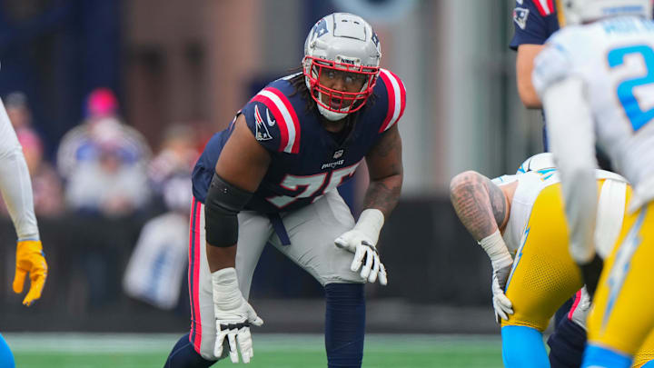 Dec 28, 2024; Foxborough, Massachusetts, USA; New England Patriots offensive tackle Demontrey Jacobs (75) lines up for a play against the Los Angeles Chargers during the first half at Gillette Stadium. Mandatory Credit: Gregory Fisher-Imagn Images