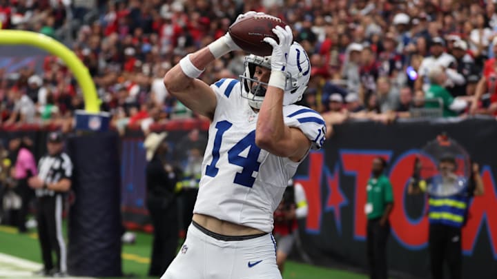 Jan 4, 2026; Houston, Texas, USA; Indianapolis Colts wide receiver Alec Pierce (14) catches a touchdown pass against the Houston Texans during the first half at NRG Stadium. Mandatory Credit: Thomas Shea-Imagn Images Jan 4, 2026; Houston, Texas, USA; Indianapolis Colts wide receiver Alec Pierce (14) catches a touchdown pass against the Houston Texans during the first half at NRG Stadium. Mandatory Credit: Thomas Shea-Imagn Images