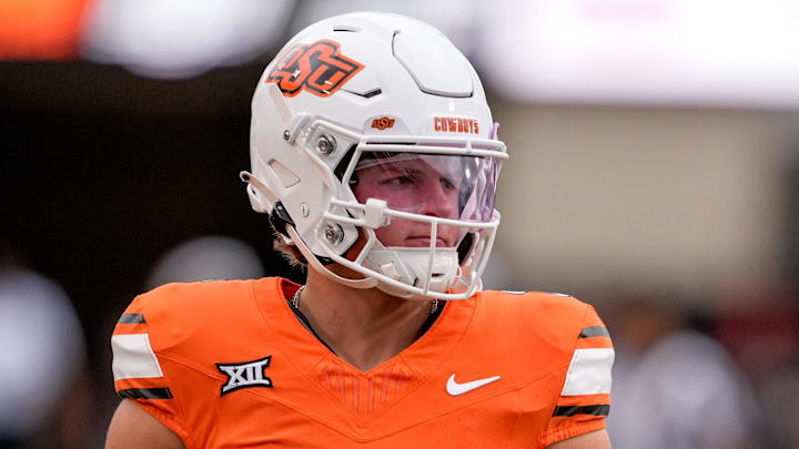 Oklahoma State quarterback Hauss Hejny (8) warms up before an NCAA football game between Oklahoma State (OSU) and UT Martin in Stillwater, Okla., on Thursday, Aug. 28, 2025.