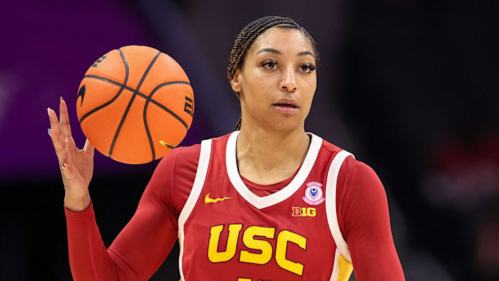 Nov 9, 2025; Charlotte, North Carolina, USA; Southern California Trojans guard Kennedy Smith (11) brings the ball down court against the NC State Wolfpack during the third quarter of the Ally Tipoff game at Spectrum Center. Mandatory Credit: Cory Knowlton-Imagn Images