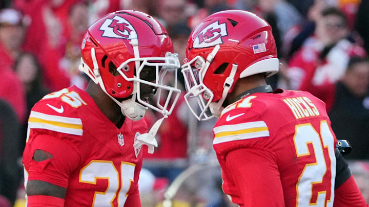 Nov 23, 2025; Kansas City, Missouri, USA; Kansas City Chiefs cornerback Jaylen Watson (35) celebrates with safety Jaden Hicks (21) after a play against the Indianapolis Colts in the second half at GEHA Field at Arrowhead Stadium. Mandatory Credit: Denny Medley-Imagn Images