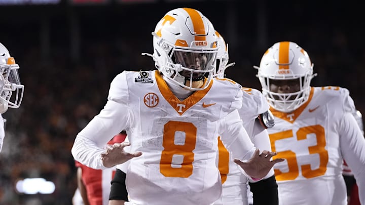 Dec 21, 2024; Columbus, Ohio, USA; Tennessee Volunteers quarterback Nico Iamaleava (8) celebrates after running for a touchdown against the Ohio State Buckeyes during the first half of a College Football Playoff first round game at Ohio Stadium. Mandatory Credit: Adam Cairns-Imagn Images