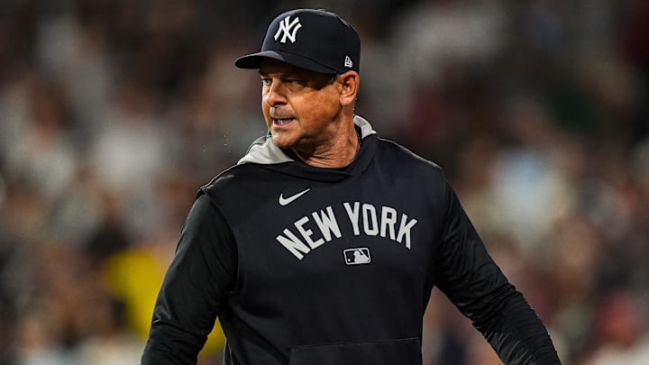 Jun 13, 2025; Boston, Massachusetts, USA; New York Yankees manager Aaron Boone (17) has words with the officials as they take on the Boston Red Sox in the tenth inning at Fenway Park. Mandatory Credit: David Butler II-Imagn Images