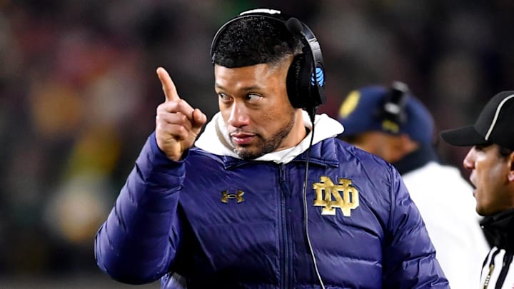 Dec 20, 2024; Notre Dame, Indiana, USA; Notre Dame Fighting Irish head coach Marcus Freeman during the third quarter against the Indiana Hoosiers at Notre Dame Stadium. 