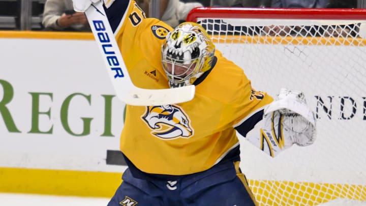Mar 19, 2026; Nashville, Tennessee, USA;  dNashville Predators goaltender Justus Annunen (29) deflects the puck S| uring the second period at Bridgestone Arena. Mandatory Credit: Steve Roberts-Imagn Images