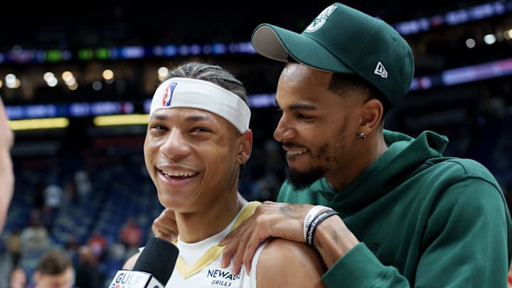 Feb 9, 2026; New Orleans, Louisiana, USA; New Orleans Pelicans guard Dejounte Murray hugs New Orleans Pelicans guard Jeremiah Fears (0) after the game against the Sacramento Kings at Smoothie King Center. Mandatory Credit: Matthew Hinton-Imagn Images Feb 9, 2026; New Orleans, Louisiana, USA; New Orleans Pelicans guard Dejounte Murray hugs New Orleans Pelicans guard Jeremiah Fears (0) after the game against the Sacramento Kings at Smoothie King Center. Mandatory Credit: Matthew Hinton-Imagn Images