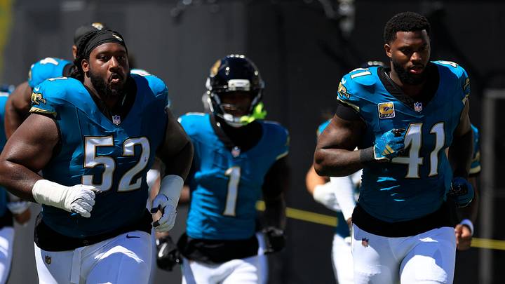 Jacksonville Jaguars defensive tackle Davon Hamilton (52) and defensive end Josh Hines-Allen (41) before an NFL football matchup at EverBank Stadium on Sunday, Sept. 27, 2026, in Jacksonville, Fla. The Jaguars defeated the Patriots 35-6. [Corey Perrine/Florida Times‑Union]