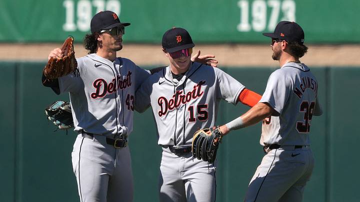 Detroit Tigers center fielder Max Clark (15) celebrates with left fielder James Outman (43) and right fielder Zach McKinstry (right). Detroit Tigers center fielder Max Clark (15) celebrates with left fielder James Outman (43) and right fielder Zach McKinstry (right).