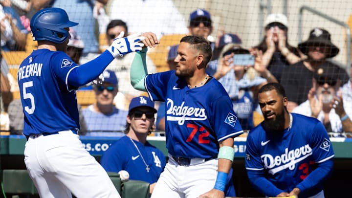 Rojas, center, is in the middle of many of the Dodgers’ in-flight poker games.
