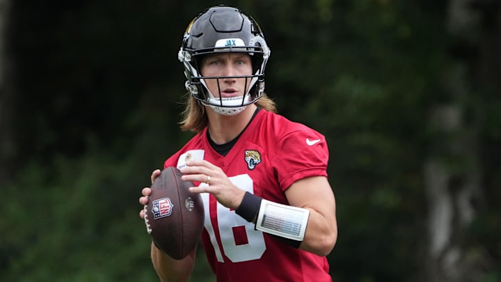 Oct 16, 2024; Watford, United Kingdom; Jacksonville Jaguars quarterback Trevor Lawrence (16) throws the ball during practice at The Grove. Mandatory Credit: Kirby Lee-Imagn Images