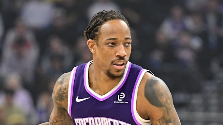 Feb 11, 2026; Salt Lake City, Utah, USA; Sacramento Kings guard/forward DeMar DeRozan (10) stares down Utah Jazz forward Jaren Jackson Jr. (20) during the first half at Delta Center. Mandatory Credit: Peter Creveling-Imagn Images