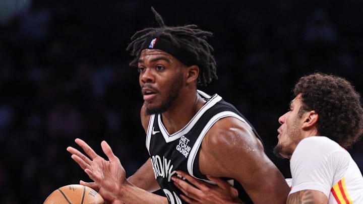Mar 16, 2025; Brooklyn, New York, USA; Brooklyn Nets center Day'Ron Sharpe (20) is defended by Atlanta Hawks forward Dominick Barlow (0) during the second half at Barclays Center. Mandatory Credit: Vincent Carchietta-Imagn Images Mar 16, 2025; Brooklyn, New York, USA; Brooklyn Nets center Day'Ron Sharpe (20) is defended by Atlanta Hawks forward Dominick Barlow (0) during the second half at Barclays Center. Mandatory Credit: Vincent Carchietta-Imagn Images