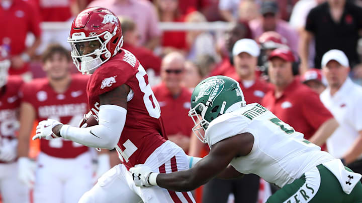 Arkansas Razorbacks wide receiver Monte Harrison (82) runs after picking up an onside kick in the first half against the UAB Blazers at Razorback Stadium. Arkansas Razorbacks wide receiver Monte Harrison (82) runs after picking up an onside kick in the first half against the UAB Blazers at Razorback Stadium.