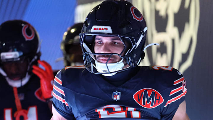 Dec 20, 2025; Chicago, Illinois, USA; Chicago Bears running back Travis Homer (21) takes the field before the game against the Green Bay Packers at Soldier Field. 