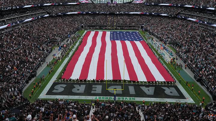 Sep 13, 2026; Paradise, Nevada, USA; A general view of Allegiant Stadium with a United States flag on the field during the national anthem before the game between Miami Dolphins and Las Vegas Raiders. Mandatory Credit: Kirby Lee-Imagn Images Sep 13, 2026; Paradise, Nevada, USA; A general view of Allegiant Stadium with a United States flag on the field during the national anthem before the game between Miami Dolphins and Las Vegas Raiders. Mandatory Credit: Kirby Lee-Imagn Images