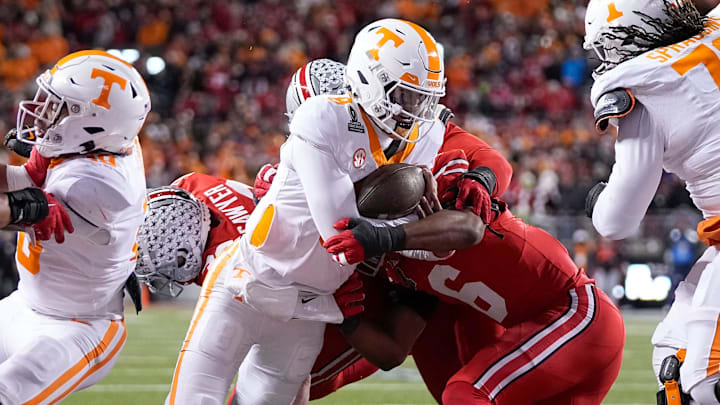 Tennessee Volunteers quarterback Nico Iamaleava (8) runs for a touchdown during the first half of the College Football Playoff first round game against the Ohio State Buckeyes at Ohio Stadium in Columbus on Dec. 21, 2024.