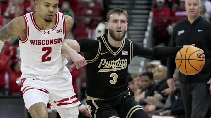 Purdue guard Braden Smith (3) drives past Wisconsin guard Nick Boyd (2) 