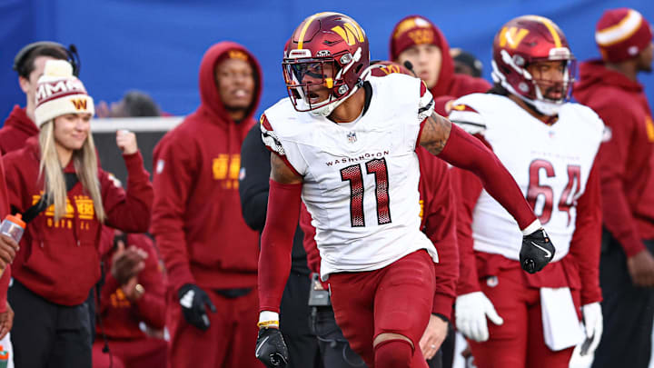 Nov 3, 2024; East Rutherford, New Jersey, USA; Washington Commanders safety Jeremy Chinn (11) reacts after a defensive stop during the second half against the New York Giants at MetLife Stadium. Nov 3, 2024; East Rutherford, New Jersey, USA; Washington Commanders safety Jeremy Chinn (11) reacts after a defensive stop during the second half against the New York Giants at MetLife Stadium.
