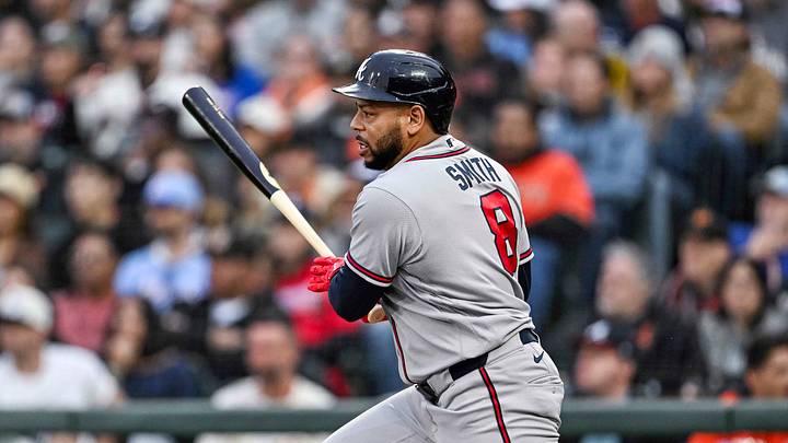 Jun 26, 2026; San Francisco, California, USA; Atlanta Braves designated hitter Dominic Smith (8) hits a RBI single to tie the game during the top of the second inning against the San Francisco Giants at Oracle Park. Mandatory Credit: Justine Willard-Imagn Images