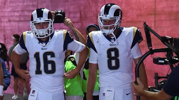 Current Detroit Lions quarterback Jared Goff (16) and quarterback Dan Orlovsky (8) as members of the Los Angeles Rams.