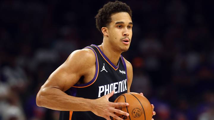 Apr 17, 2026; Phoenix, Arizona, USA; Phoenix Suns forward Oso Ighodaro (11) against the Golden State Warriors during the play-in rounds of the 2026 NBA Playoffs at Mortgage Matchup Center. Mandatory Credit: Mark J. Rebilas-Imagn Images