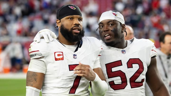 Dec 15, 2024; Glendale, Arizona, USA; Arizona Cardinals linebacker Kyzir White (7) and linebacker Victor Dimukeje (52) against the New England Patriots at State Farm Stadium. Mandatory Credit: Mark J. Rebilas-Imagn Images