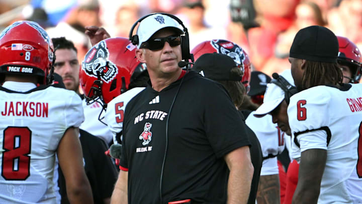 Sep 20, 2025; Durham, North Carolina, USA;  NC State Wolfpack head coach Dave Doeren during the second quarter against the Duke Blue Devils at Wallace Wade Stadium. Mandatory Credit: Zachary Taft-Imagn Images