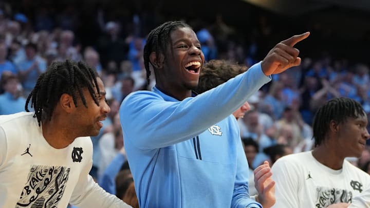 Feb 23, 2026; Chapel Hill, North Carolina, USA; North Carolina Tar Heels forward Caleb Wilson (8) and the bench react in the second half at Dean E. Smith Center. Mandatory Credit: Bob Donnan-Imagn Images